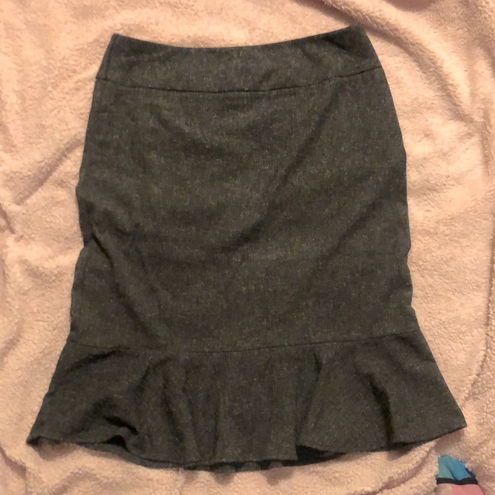 Ladies long ruffle hem side zip pencil skirt.